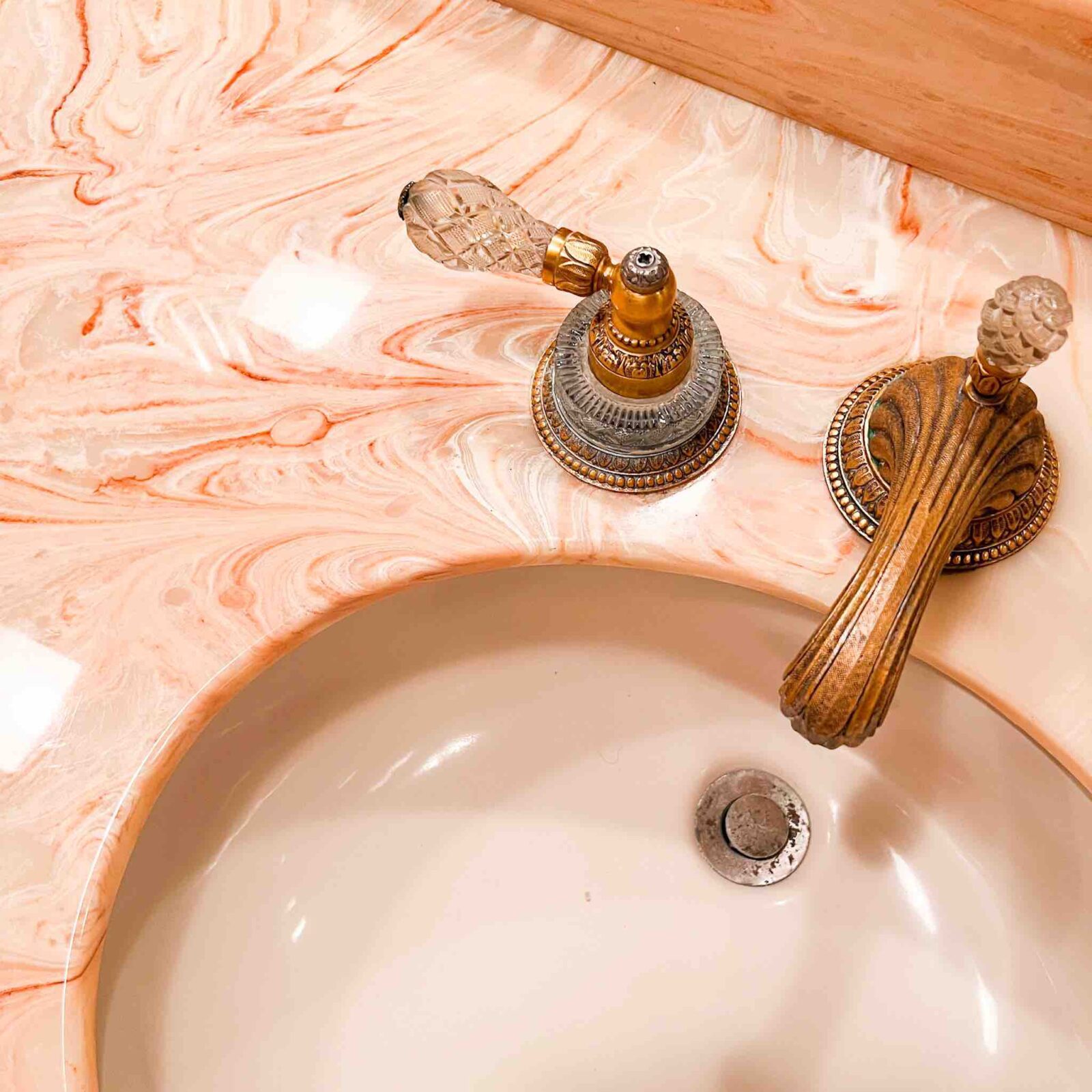 Pink marble bathroom countertop and sink