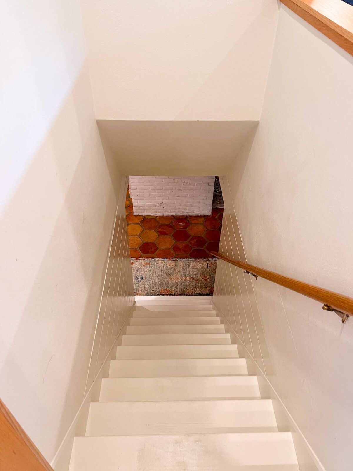 White-painted basement stairwell 